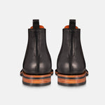 Chelsea boots in black back view