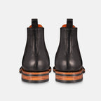 Chelsea boots in black back view